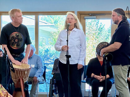 Three musicians mid-act