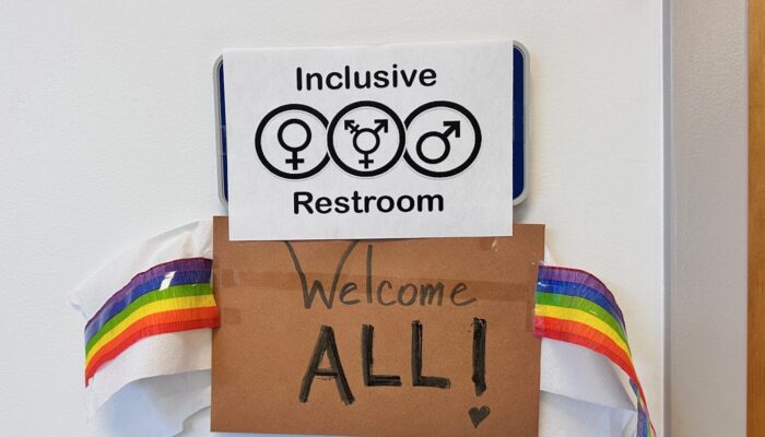 Signage for inclusive restroom